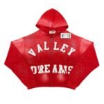 Vale Hoodie Red in ruby red with a hood, printed design, and distressed worn-effect finish.